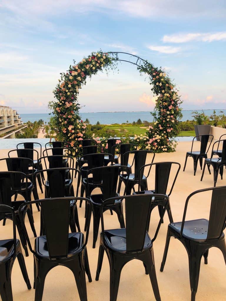 What is a micro wedding - ceremony in Mexico, black chairs