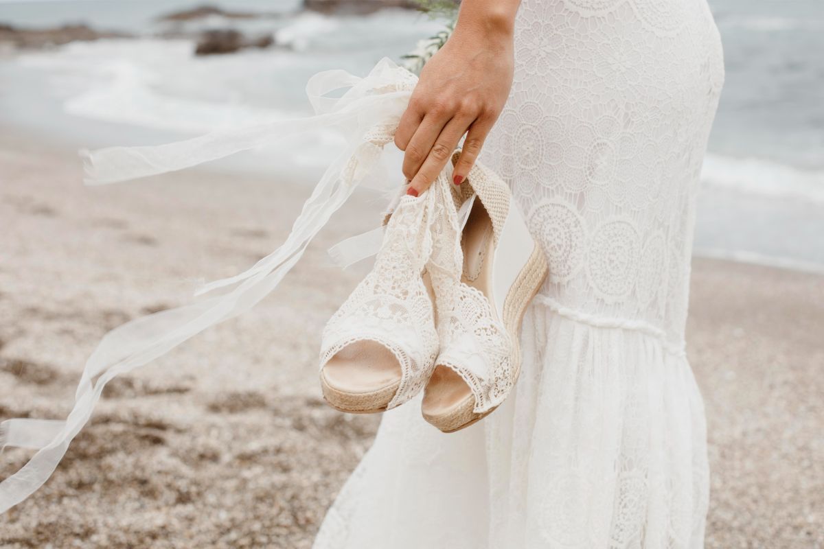 Cottagecore-wedding-venues-sand-sandals-bride-dress
