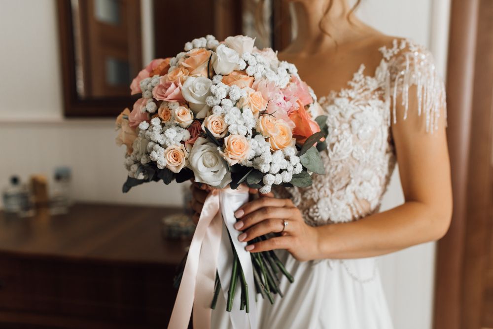 -Victorian-wedding-brides-bouquet-made-of-roses-and-white-flowers