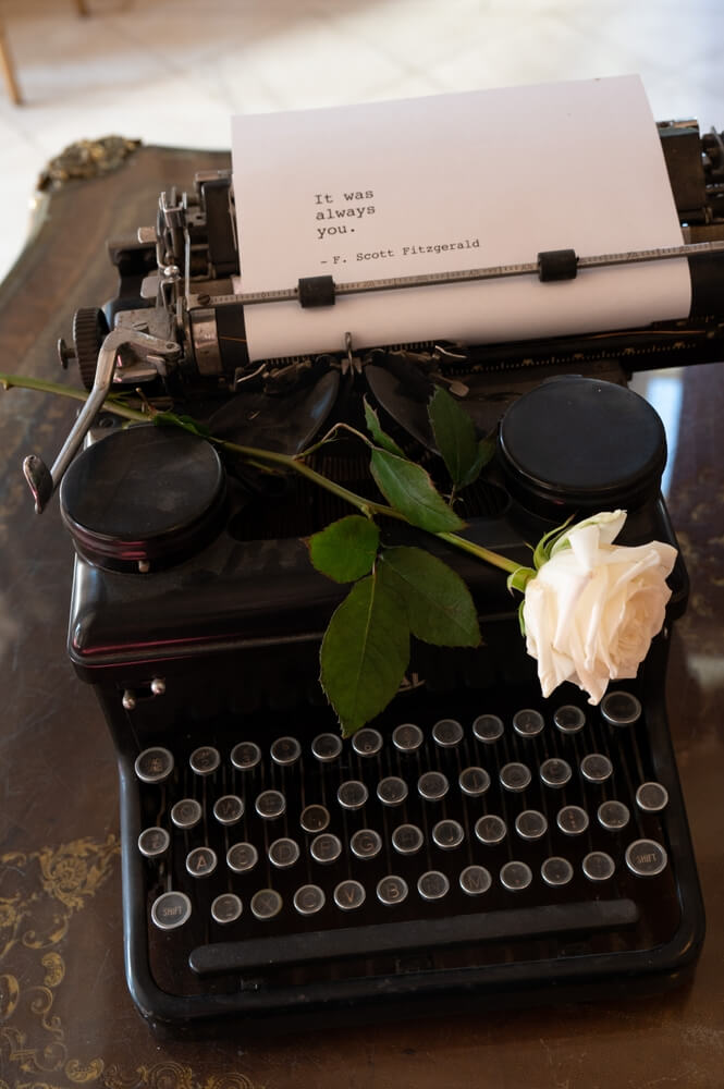 Pearls, pocket watches & party favors - The finishing touches of a grand roaring 20s themed wedding (typewriter)